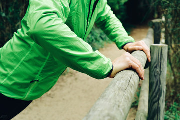 young sportsman doing incline push-ups