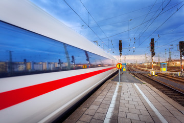 Fototapeta premium High speed passenger train on tracks in motion