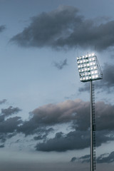 Obraz premium stadium lights and overcast sky