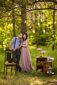 Fashion couple in the wood