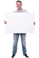 Full length of man with blank board.