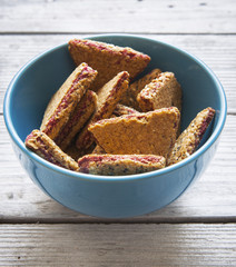 Raspberry chip cookies in blue bowl