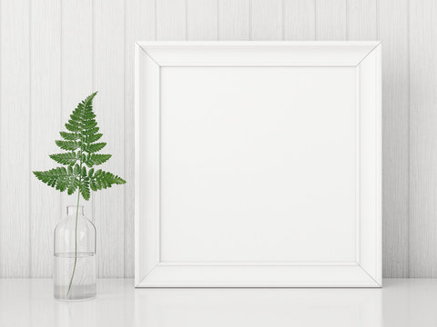 Square interior poster mock up with empty frame and fern leaf in glass bottle on white wall background. 3D rendering.