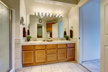 Bathroom interior with opened white door