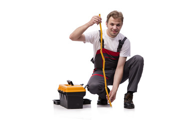 Young repairman with tape measure isolated on white