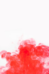 Background of abstract red color smoke on white background with copyspace