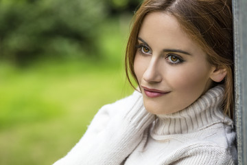 Fototapeta premium Thoughtful Beautiful Young Woman With Red Hair