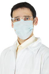 Portrait of a doctor in a white coat and mask