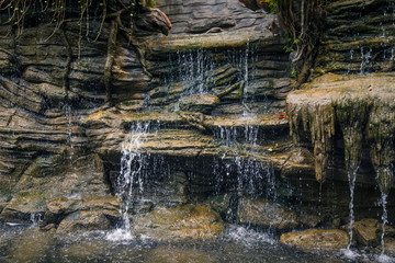 Fototapeta na wymiar Waterfall stream rocks