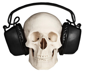 Human skull with music headphones on white background