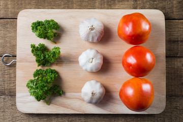 Food series : Parsley, garlic and tomatoes, represents flag of Italy