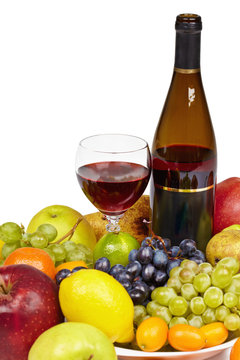 Wine and fruit - still life on white background