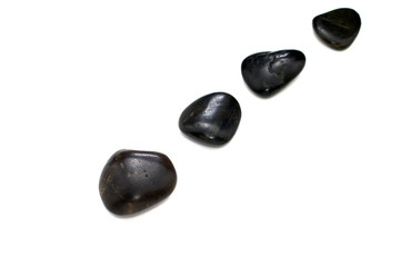 Fototapeta na wymiar Black SPA stones set isolated on white background