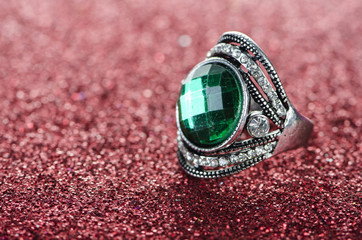 Jewellery ring against shiny background