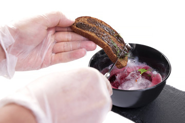 Molecular Cuisine. Delicious soup with beetroot.