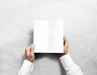 Hand opening blank white flyer brochure booklet mockup. Leaflet presentation. Pamphlet mock up...