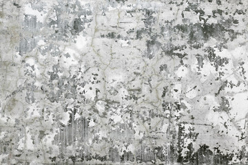 Gray wall with stains and cracks - background