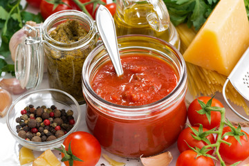 tomato sauce and ingredients for pasta, closeup