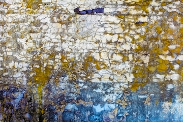 Old concrete wall with spots and cracks