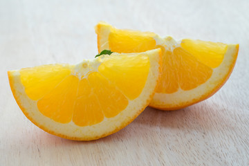 orange fruit slice on wood background