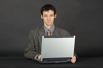 Man working with laptop computer