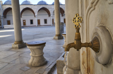 Antique Turkish faucet on wall