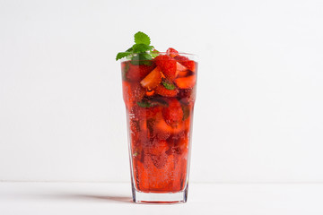 Strawberry mojito cocktail on the wooden background