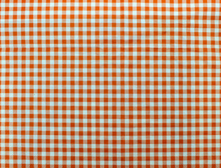 Wooden table covered with tablecloth