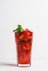 Strawberry mojito cocktail on the wooden background