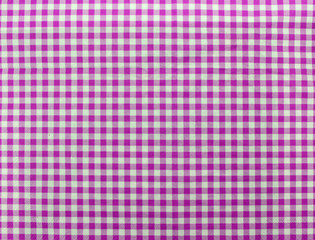 Wooden table covered with tablecloth