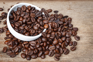 Coffee bean on the wooden floor