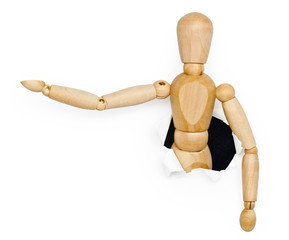 Toy wooden person was put out from hole