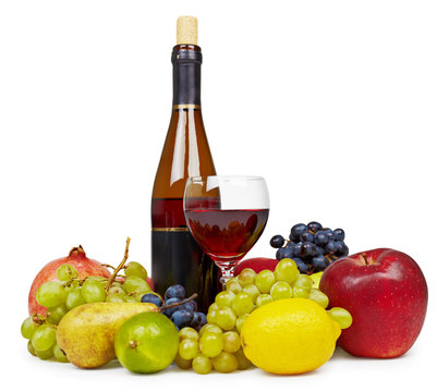 Still life of fruit and wine on white