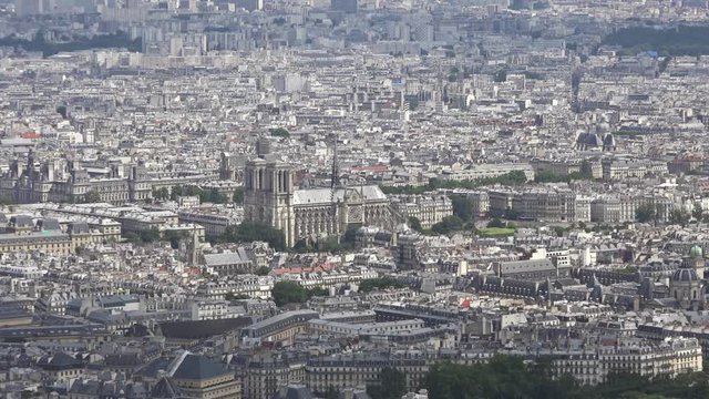 Famous Notre Dame From Top Of Montparnasse Tower, Paris. Notre Dame de Paris is a medieval Catholic cathedral in Paris. Considered to be one of the finest examples of French Gothic architecture