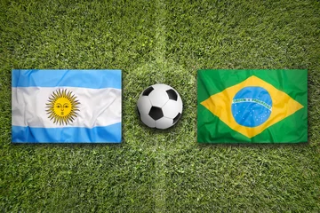 Crédence de cuisine en verre imprimé Foot Argentina vs. Brazil flags on soccer field