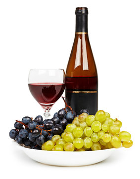Bottle, glass with red wine and grapes