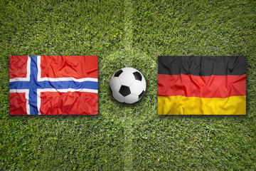 Norway vs. Germany flags on soccer field