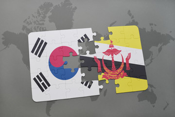 puzzle with the national flag of south korea and brunei on a world map background.