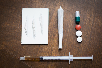 close up of different drugs on table