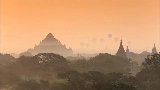 Scenic sunrise old pagoda with balloon at Bagan Myanmar