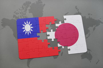 puzzle with the national flag of taiwan and japan on a world map background. © luzitanija