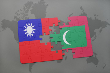 puzzle with the national flag of taiwan and maldives on a world map background.