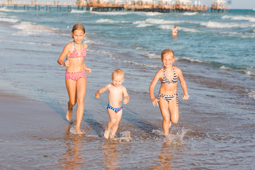 Happy kids on the beach