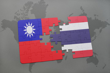 puzzle with the national flag of taiwan and thailand on a world map background.
