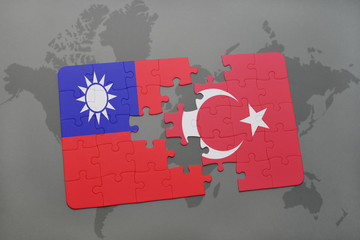 puzzle with the national flag of taiwan and turkey on a world map background.