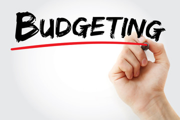 Hand writing Budgeting with marker, concept background