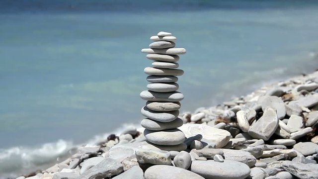 stack of zen stones on the beach