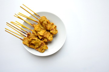 Satay pork in dish