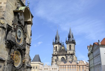 Tyn church and astronomical clock with blue sky