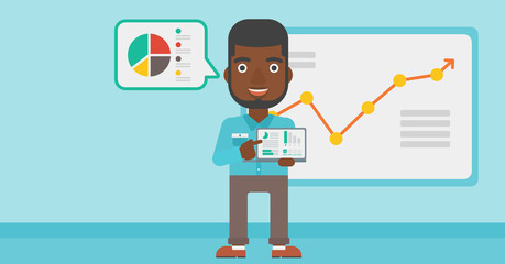 Businessman presenting report on a laptop.